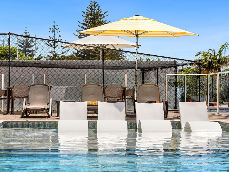 pool with sun loungers